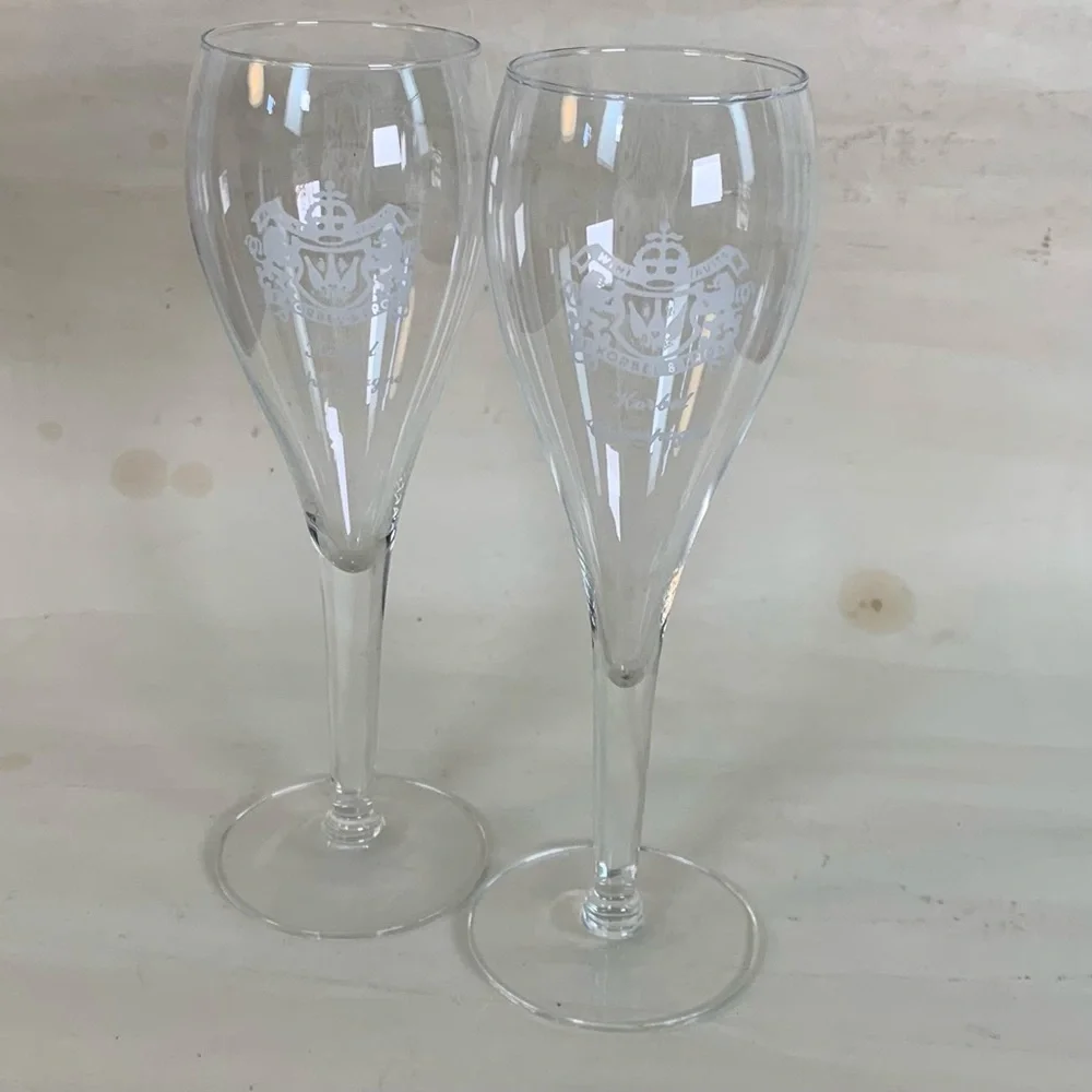 A pair of Korbel & Brothers Champagne glass flutes.